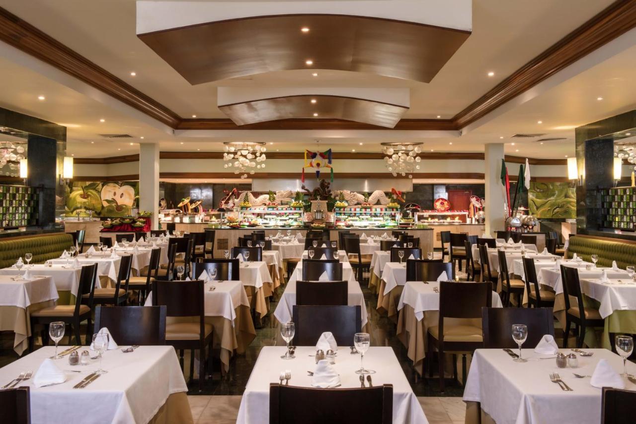 Grand Sunset Princess Playa del Carmen Esterno foto The interior of the restaurant