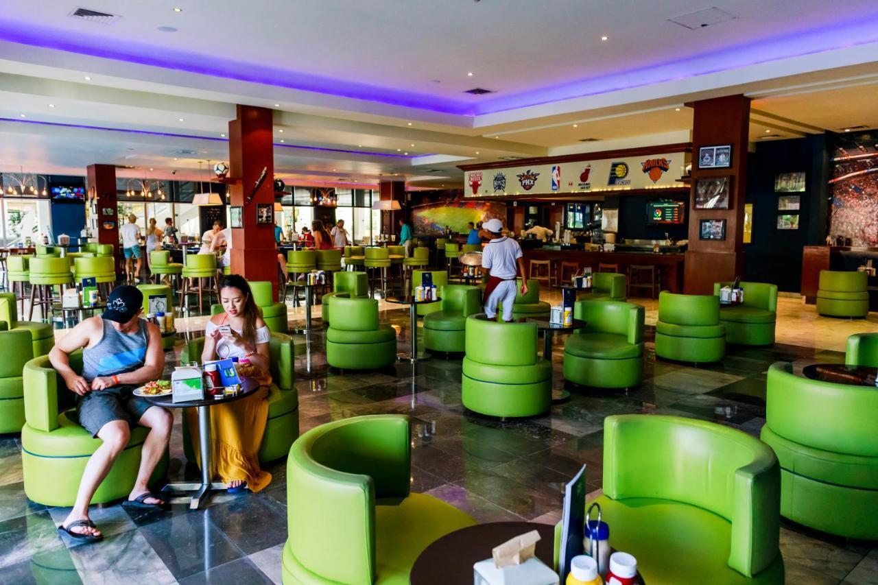 Grand Sunset Princess Playa del Carmen Esterno foto The interior of the restaurant