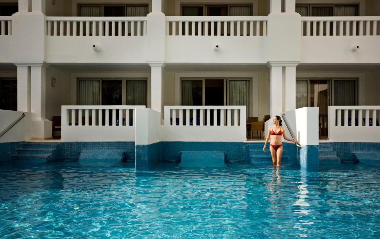 Grand Sunset Princess Playa del Carmen Esterno foto The swimming pool at the hotel