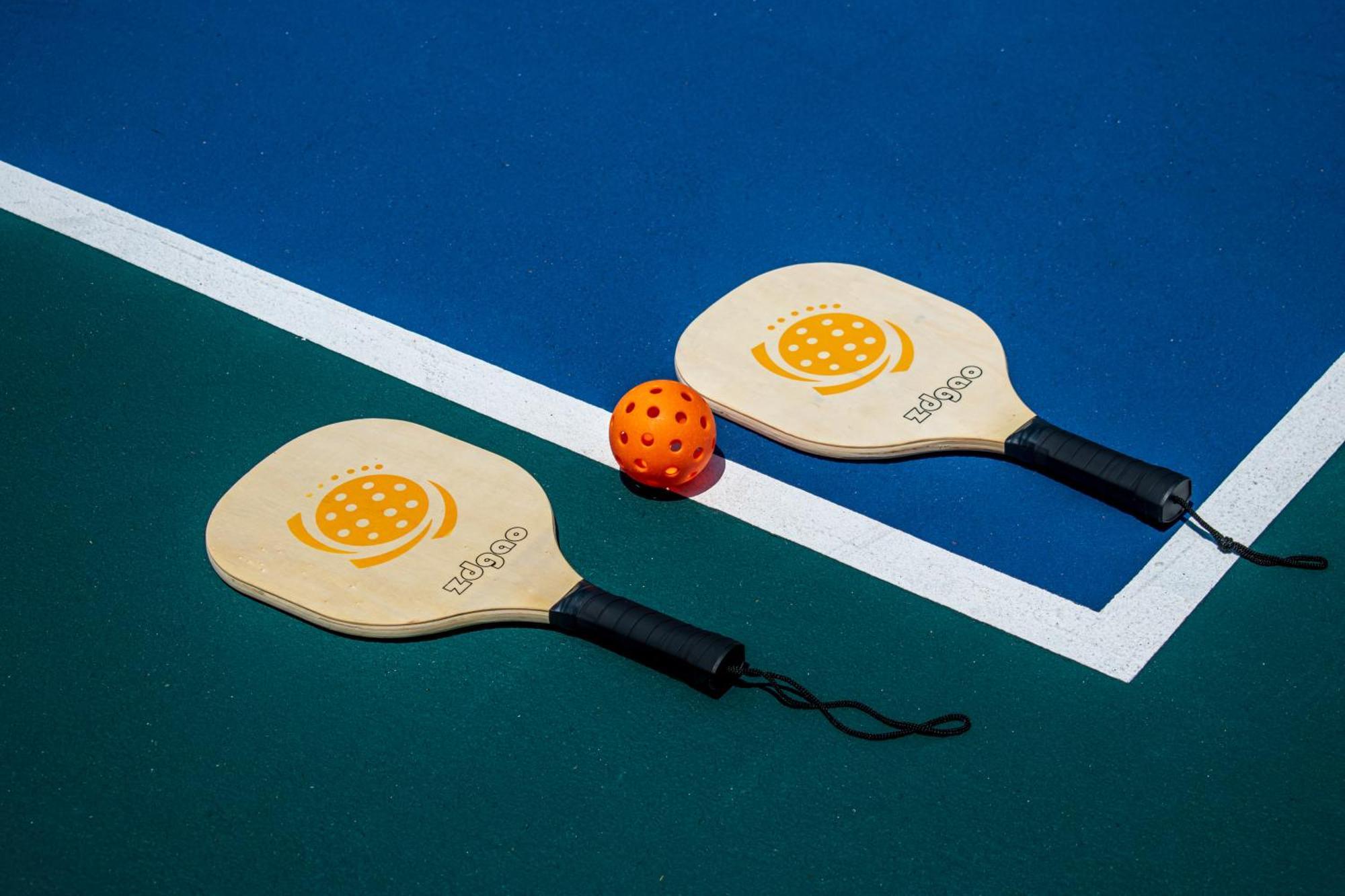 Grand Sunset Princess Playa del Carmen Esterno foto Pickleball paddles and ball